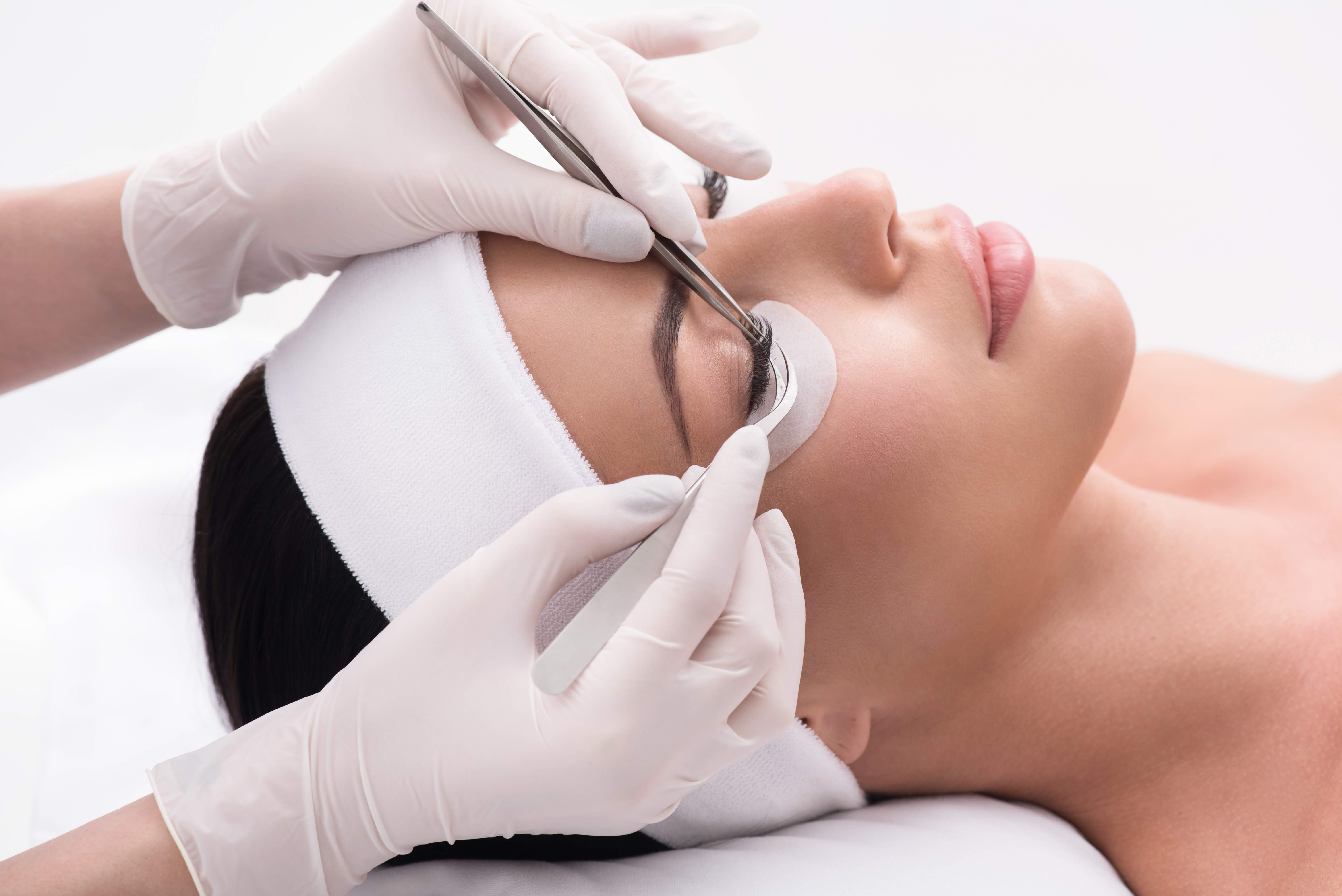 Woman having a lash extension treatment